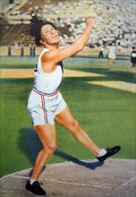 Photograph of Lillian Copeland (1904 - 1964) throwing the discus at the 1932 Olympic games. Lillian took gold for the USA and set a new world record at 133.16 feet.