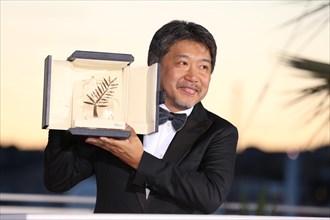CANNES, FRANCE – MAY 19, 2018: Hirokazu Kore-eda at the Award Winners photocall during the 71st Cannes Film Festival (photo by Mickael Chavet)