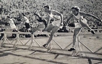 Photograph of Mildred Ella "Babe" Didrikson Zaharias (1911 - 1956)  winning the 80m Hurdles at the 1932 Olympic games. Babe gained world fame in track and field and All-American status in basketball.
