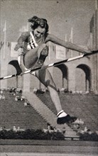 Photograph of Jean Shiley (1911- 1998) high jumping at the 1932 Olympic games. Although jumping the same height as Babe Didrikson 1.676 meters, Jean was awarded the Gold medal as Didriksons jump was c...