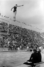 Summer Olympics 1936 - Germany, Third Reich - Olympic Games, Summer Olympics 1936 in Berlin. Women swimming competition at the swimming stadium  - platform diver - view of the jump. Image date August ...