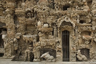 Detail of the east facade of the Ideal Palace (Le Palais idéal) designed by French postman Ferdinand Cheval and build from 1876 to 1912 in Hauterives, France. ATTENTION: This image is a part of a phot...