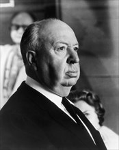 Film director Alfred Hitchcock on the set of,  "Torn Curtain"  (1966) Universal Pictures File Reference # 34000-255THA