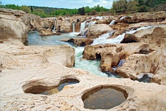 The river in the rocks in Sautadet in Occitanie France