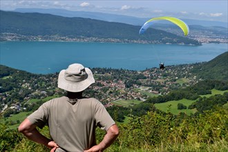 paragliding over annecy,'s lake, haute savoie, france