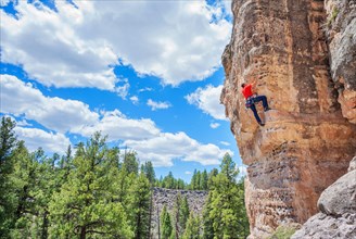 Man rock climbing at The Pit (Le Petit Verdon) in Sandy's Canyon, Flagstaff, Arizona, USA, North America