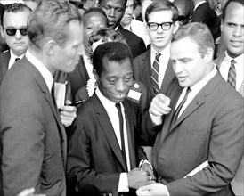 Civil Rights March on Washington, D.C. [Author James Baldwin with actors Marlon Brando and Charlton Heston] ca.  28 August 1963