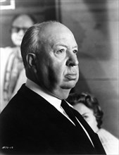 ALFRED HITCHCOCK on set candid portrait during filming of TORN CURTAIN 1966 director ALFRED HITCHCOCK writer Brian Moore music John Addison Alfred J. Hitchcock Productions / Universal Pictures