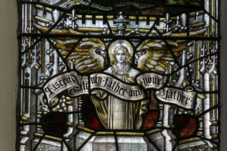 Stained glass window, interior of the church of St Edmund in the village of Maids Moreton, Buckinghamshire, UK;