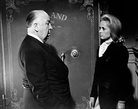 Alfred Hitchcock and Tippi Hedren at set for "Marnie" (1964) Alfred Hitchcock and Tippi Hedren at set for "Marnie" (1964)