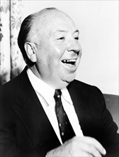 Alfred Hitchcock, head-and-shoulders portrait, facing right 1956 by Fred Palumbo.