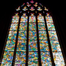 ABBEVILLE, SOMME, FRANCE, JUNE 18, 2023 :  details of stained glasses windows in Saint Sepulcre church, by Alfred Manessier workshop, year 1989  to 19