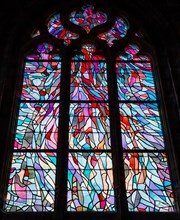 ABBEVILLE, SOMME, FRANCE, JUNE 18, 2023 :  details of stained glasses windows in Saint Sepulcre church, by Alfred Manessier workshop, year 1989  to 19