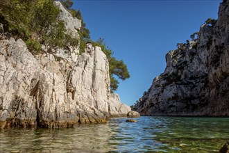 Kayaking to the Calanques fjords on the Mediterranean sea near Cassis in summer