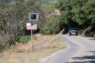 Road sign "Caution: Grape Harvest" at the entrance of Puyloubier, the largest vineyard in Bouches-du-Rhône, known for its AOC Côtes de Provence Sainte