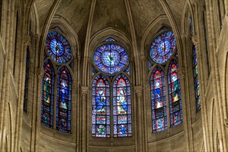 View of Stained Glass windows from inside Notre Dame de Paris