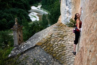 A climber on the cliffs known as the Tennessee Walls, Gorges du Tarn, near Millau and Rodez, Cevennes region, France