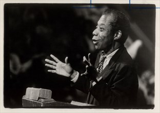 (Cropped mug published T, 05/04/1979, B-8) Author James Baldwin speaking about American racism to a predominantly black audience at UCSD on 05/03/1979.