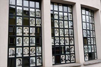 Pictures of Jewish victims of the Nazi holocaust on the windows of the Oskar Schlinder factory, Krakow