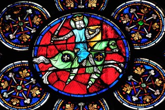 Paris, France. Notre Dame cathedral. Stained glass window - 'Sanctus Ludovicus' - Saint Louis / King Louis IX