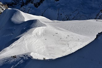 Mountaineers near Aiguille du Midi, Chamonix, France.