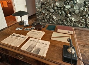 Schindler's desk in his office, artistic installation by Michal Urban behind, Oskar Schindler's Factory Museum in Krakow, Poland