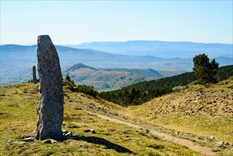 Granite pillars called montjoies mark the route of the Robert Louis Stevenson Trail on Mont Lozère in the Cévennes France