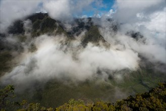 Views from Morne Langevin. The Morne Langevin is a mountain peak on the island of Reunion, a French overseas department in the Indian Ocean sea. Located in the municipality of Saint-Joseph, which rise...