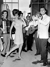 Raquel Welch and Marcello Mastroianni dancing at a club