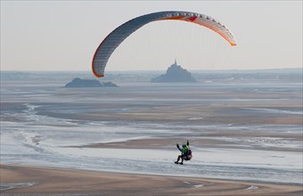 paragliding, mont st michel, normandy, france