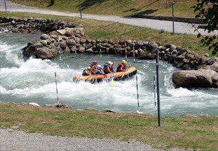 White water rafters at artificial slalom course in Pau, France
