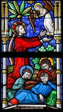 LIER, BELGIUM - MAY 16, 2015: Stained Glass window in St Gummarus Church in Lier, Belgium, depicting Jesus in the Garden of Geth