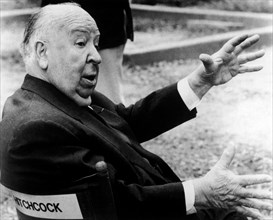 British director and producer ALFRED HITCHCOCK on the set, 1963.