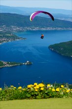 paragliding over the lake Annecy, France, Haute-Savoie