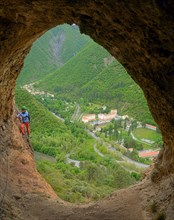 climber in a rock window, Via ferrata du Rocher de Neuf Heures, France, Provence, Digne-les-Bains