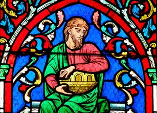 Noah and his Ark on a Stained Glass window in Notre Dame Cathedral of Paris, France.