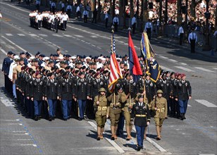 U.S. soldiers, sailors, marines and airmen assigned to units in Europe march down the Champs Élysées during the annual Bastille Day military parade July 14, 2017 in Paris, France. U.S. President Donal...