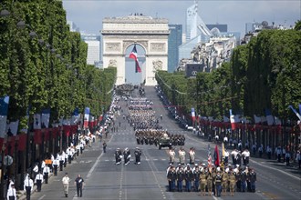 U.S. soldiers, sailors, marines and airmen assigned to units in Europe march down the Champs Élysées during the annual Bastille Day military parade July 14, 2017 in Paris, France. U.S. President Donal...