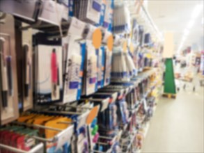 Blurred background of school supplies in a supermarket, back to school concept