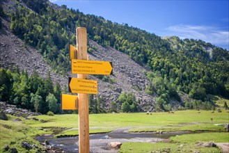 Hiking direction sign in Ossau Valley, Pyrenees, France
