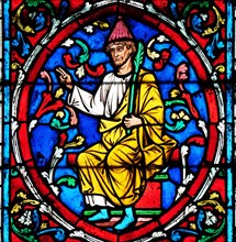 Colorful stained glass window in the Notre Dame Cathedral, UNESCO World Heritage Site in Paris, France