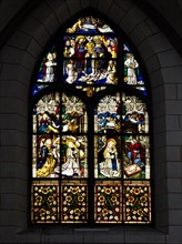 Medieval  stained glass window in Augsburg cCathedral, a romanesque basilica style Roman Catholic cathedral in Augsburg, Germany