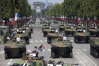 French soldiers, sailors, airmen and Marines lmarch in the annual Bastille Day military parade down the Champs-Elysees in Paris, July 14, 2017. DoD