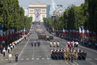 American soldiers, sailors, airmen and Marines lead the annual Bastille Day military parade down the Champs-Elysees in Paris, July 14, 2017. DoD