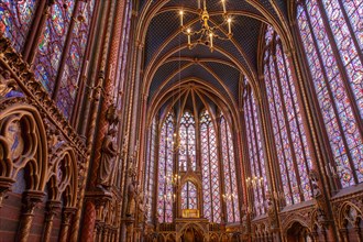 Stained glass windows inside the Sainte Chapelle a royal Medieval chapel in Paris, France.