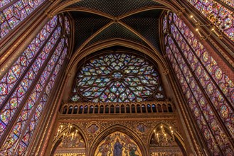 Detail of a stained glass window in Sainte-Chapelle , a royal chapel in the Gothic style, within the medieval Palais de la Cité , Paris