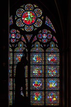 PARIS, FRANCE - APRIL 25: Stained glass window in Cathedral Notre Dame de Paris on april 25, 2011 in Paris.