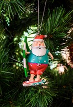 Australian Father Christmas decoration hanging on a Christmas tree in Australia