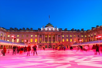 Somerset House, London, UK, 13th November 2019. Visitors enjoy skating on the pristine ice in the beautifully illuminated surroundings of Somerset House, as the annual 'SKATE' ice rink opens to the pu...