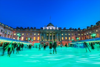 Somerset House, London, UK, 13th November 2019. Visitors enjoy skating on the pristine ice in the beautifully illuminated surroundings of Somerset House, as the annual 'SKATE' ice rink opens to the pu...